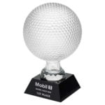 Clear Glass Golf Ball on Black Base