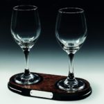 Two Wine Glasses on Wood Stand